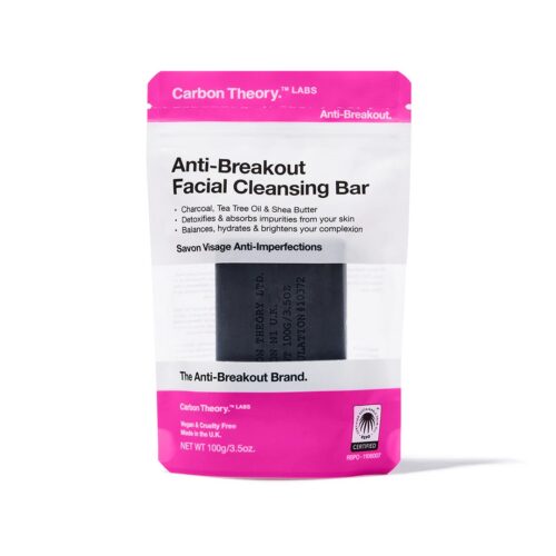 Carbon Theory Anti Breakout Charcoal and Tea Tree Oil Facial Cleansing Bar in a pink & white clear bag